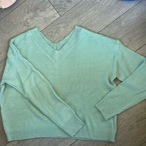 V neck sweater.